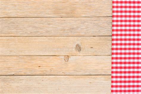 Wood Table Top Background With Red Picnic Tablecloth Stock Photo