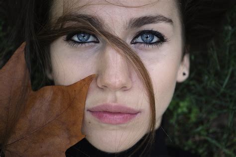 Online Crop Womans Close Up Photography With Dried Leaves On Face Hd Wallpaper Wallpaper Flare