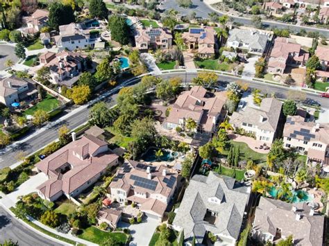 Aerial View Suburban Neighborhood With Identical Villas Next To Each