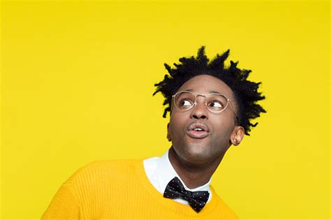 Funny Portrait Of Surprised Nerdy Young Man Looking Up