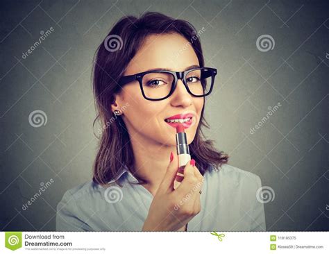 stylish girl applying red lipstick stock image image of glamour flawless 118185375