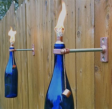Wine Bottle Tiki Torch 221 Upcycling Ideas That Will Blow Your Mind
