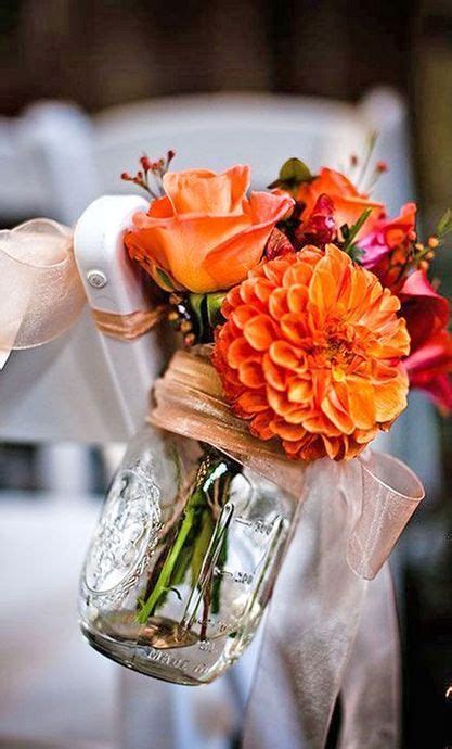 Shop 40+ types of flowers online, today! orange flower arrangement in a mason jar for wedding aisle ...
