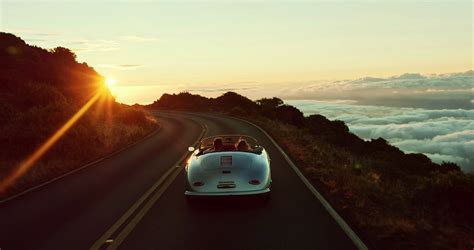 You'll start your utah national parks road trip in las vegas or salt lake city. Happy couple driving on country road into the sunset in ...