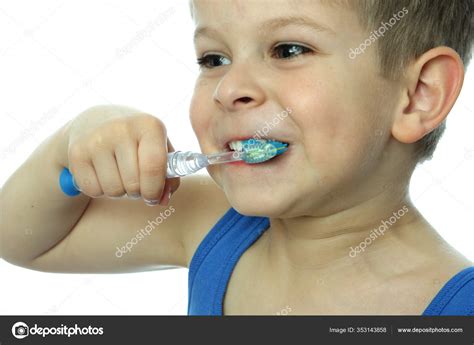 Boy Brushing Teeth Toothbrush Stock Photo By ©panthermediaseller 353143858