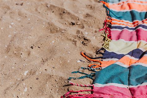 royalty free photo colorful beach towel on the sand pickpik