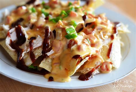 Repeat with another layer of chips, chicken and cheese. BBQ Chicken Nachos