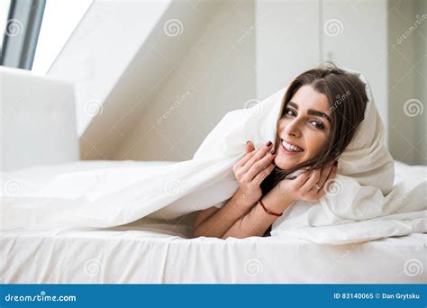 Smiling Woman Under A Duvet Stock Image Image Of Awakening Heating