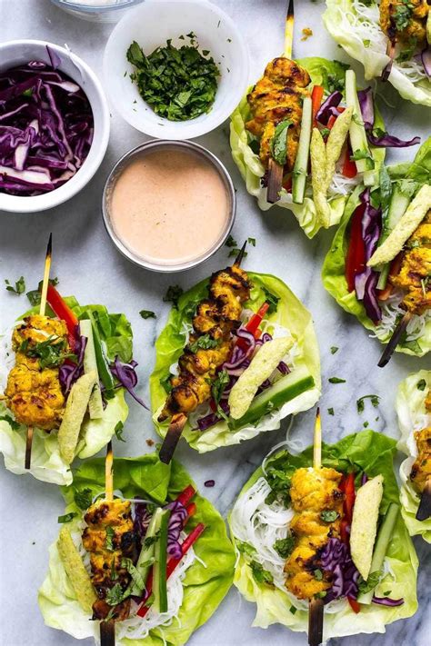 Today we are sharing one of our favorite healthy chicken wraps. Chicken Satay Lettuce Wraps | The Girl on Bloor