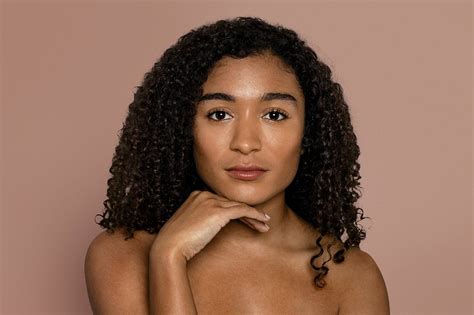 curly hair latina woman portrait premium photo rawpixel