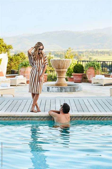 Couple At Luxury Resort Poolside By Stocksy Contributor Trinette Reed Stocksy