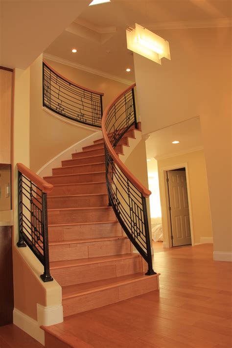 Note that we only do curved stair railing in our polyurethane line of railing. curved staircase with wrought iron custom handrail ...