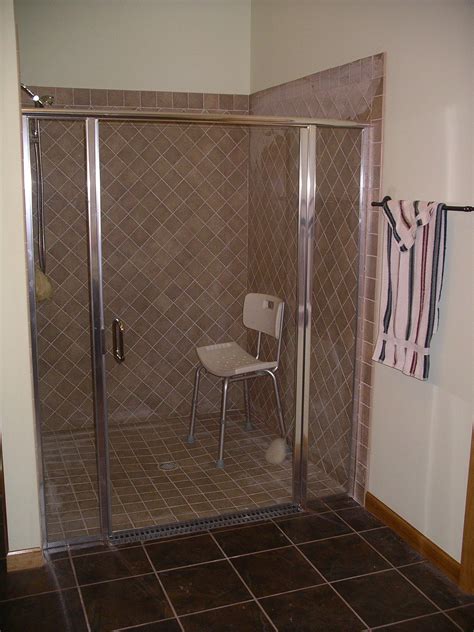Handicap Accessible Tile Shower With Glass Doors Completed By Gildehaus