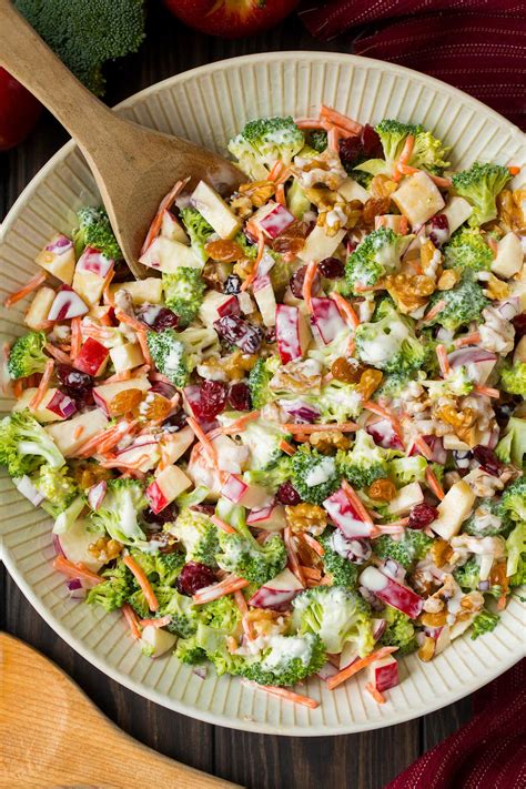 Florets of broccoli and cauliflower are mixed with chopped apples and mandarin oranges and topped with catalina salad dressing and sunflower seeds. Broccoli Apple Salad - Cooking Classy