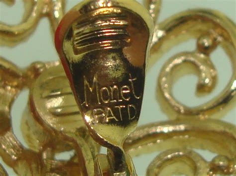 Beautiful Vintage 1970s Era Monet Patd Gold Tone Filigree Earrings