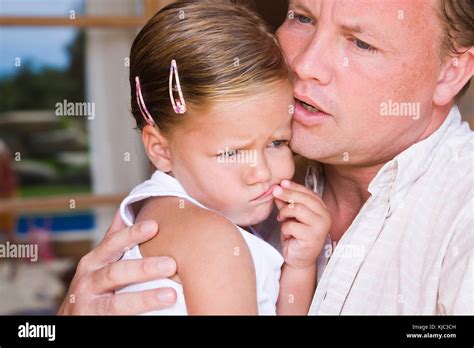 Father Comforting Daughter Stock Photo Alamy