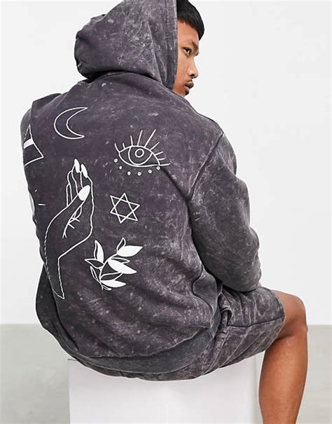Asos Design Oversized Hoodie In Black Acid Wash With Mystic Back Print
