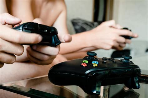 Person Holding Black Xbox Game Controller · Free Stock Photo