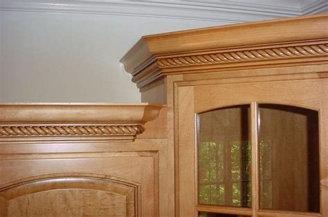 The challenge is that there is little room on the top to nail the crown directly into the cabinets. Crown Molding On Kitchen Cabinets - Carpentry - DIY ...