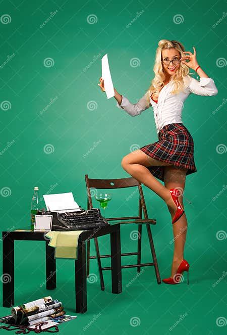 Pin Up Girl Secretary At The Reception Near The Typewriter Stock Image