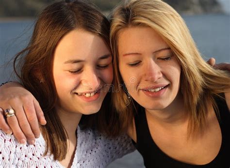 two sisters having fun stock image image of blue enjoyment 4037661