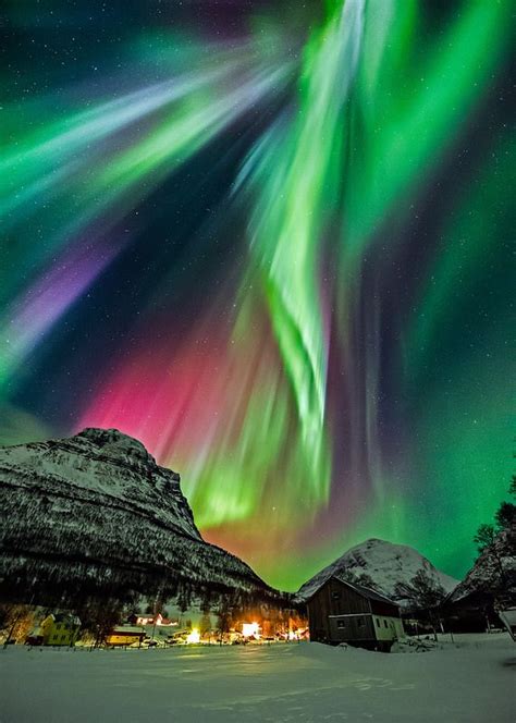 Beautiful Aurora Borealis On The Night Sky