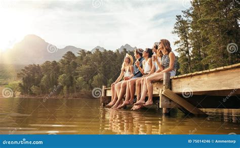 Friends Hanging Out At The Lake Stock Photo Image Of Friends Party