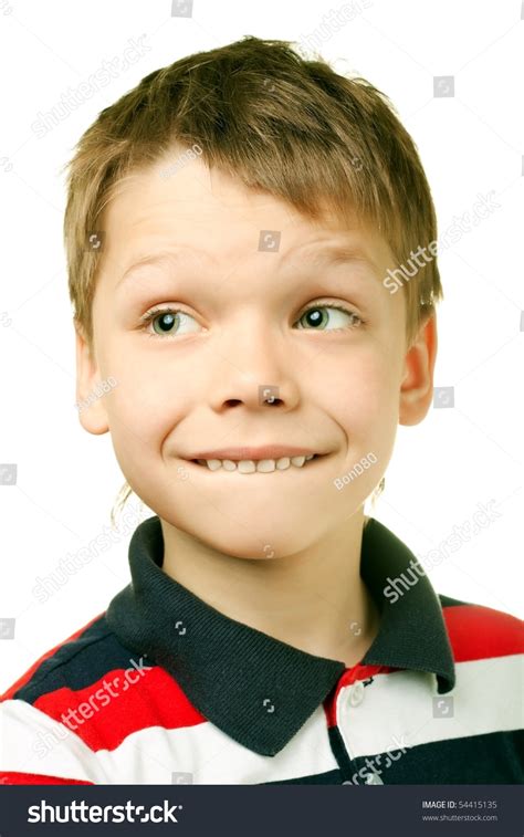 Adorable 7 Year Old European Boy Against White Background Stock Photo