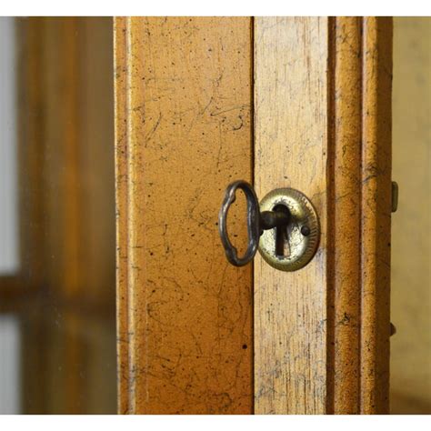 Over the years, the owners of this home tried to update their kitchen. Hollywood Regency Vintage 1960's Serpentine Giltwood Bow Glass Curio Vitrine Cabinet | Chairish