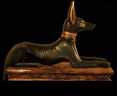 A Carved Wooden Statue Of Anubis The Ancient Egyptian God Of Embalm