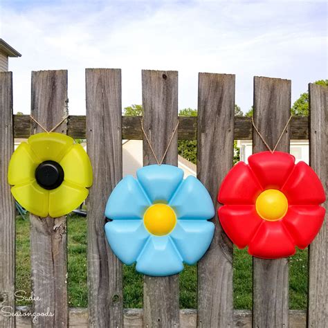 Whimsical Garden Decor And Fence Decorations From Party Trays