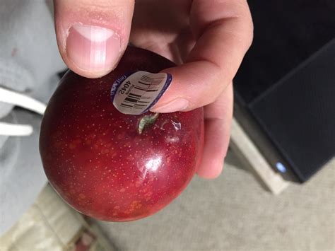the placement of this sticker used to hide an impurity on my peach impurities class ring