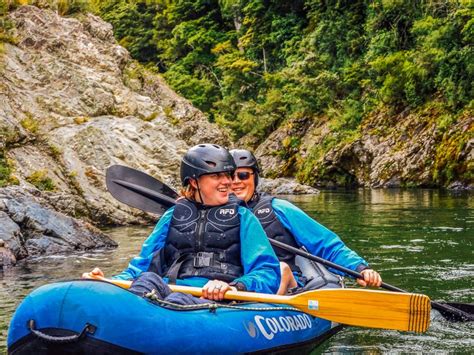 Happy Couple Kayaking At The Pelorus River Kayak New Zealand