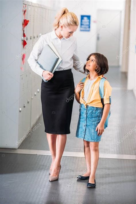Teacher And Schoolgirl Walking Together — Stock Photo