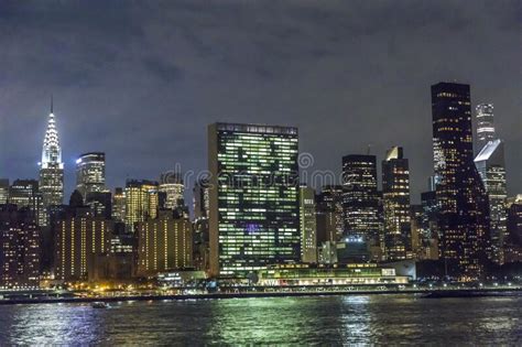 Panoramic View To New York By Night With Un Building And Illuminated