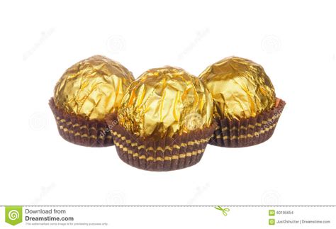 Chocolate Balls Wraped With Golden Foil Isolated On White Stock Photo
