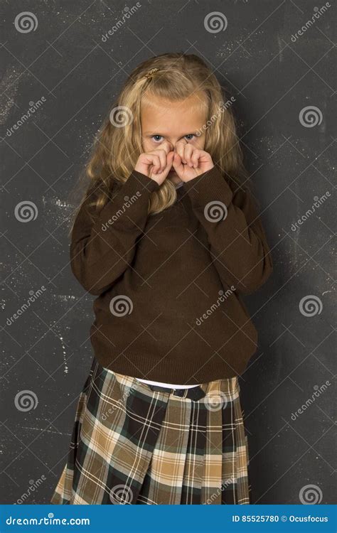 Beautiful Blond Schoolgirl Crying Sad Moody And Tired In Front Of