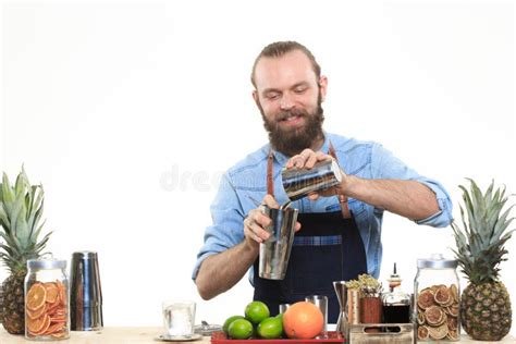 Bartender With A Shaker And Bottle Behind The Bar Stock Photo Image