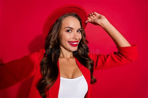 Photo Of Impressed Brunette Lady Do Selfie Wear Cap Blazer Isolated On Red Color Background