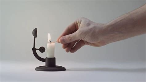 A Cleverly Crafted Candlestick That Extinguishes Itself When The Candle Becomes Too Short