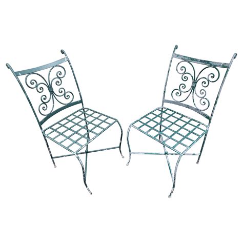 Pair Of White Iron Chairs At 1stdibs