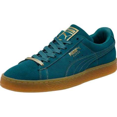 Since 1948, puma has changed the game with speed, spontaneity, and performance innovation. PUMA Suede Classic Gold Foil Men's Sneakers in Blue for ...