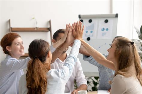Happy Motivated Business Team Giving High Five After Successful