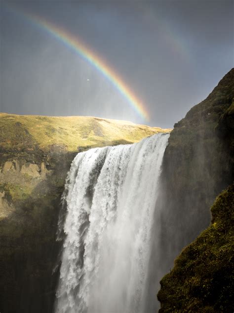 Rainbow Over The Waterfall At Skogafoss Image Free Stock Photo