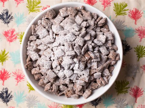 Rice chex coated in a thick chocolate and peanut butter layer with powdered sugar! Puppy Chow: The Must-Try Chocolaty, Peanut Buttery Midwestern Snack | Serious Eats