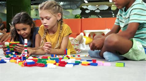 Group Of Funny Kids Playing With Block Toys Indoor Cute Kids Playing
