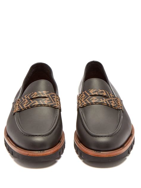 Fendi Logo Embellished Leather Penny Loafers In Black Brown Brown For