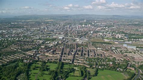 6K stock footage aerial video of a wide city view of Glasgow, Scotland ...