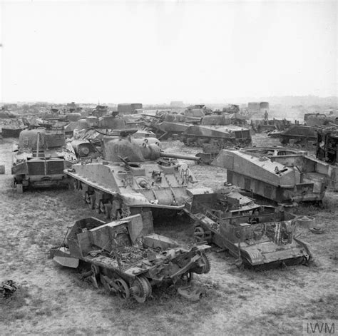 The Remains Of Sherman Tanks And Carriers Waiting To Be Broken Up At A