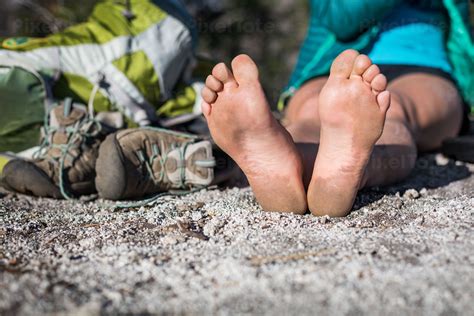 Bare Feet Of A Woman Resting Stock Photo Pixeltote